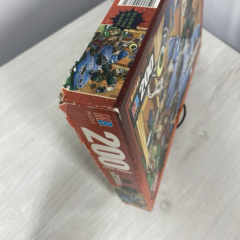 Lot of Two Vintage 1998 Milton Bradley Small Soldiers Glow Dark 200pc Puzzles